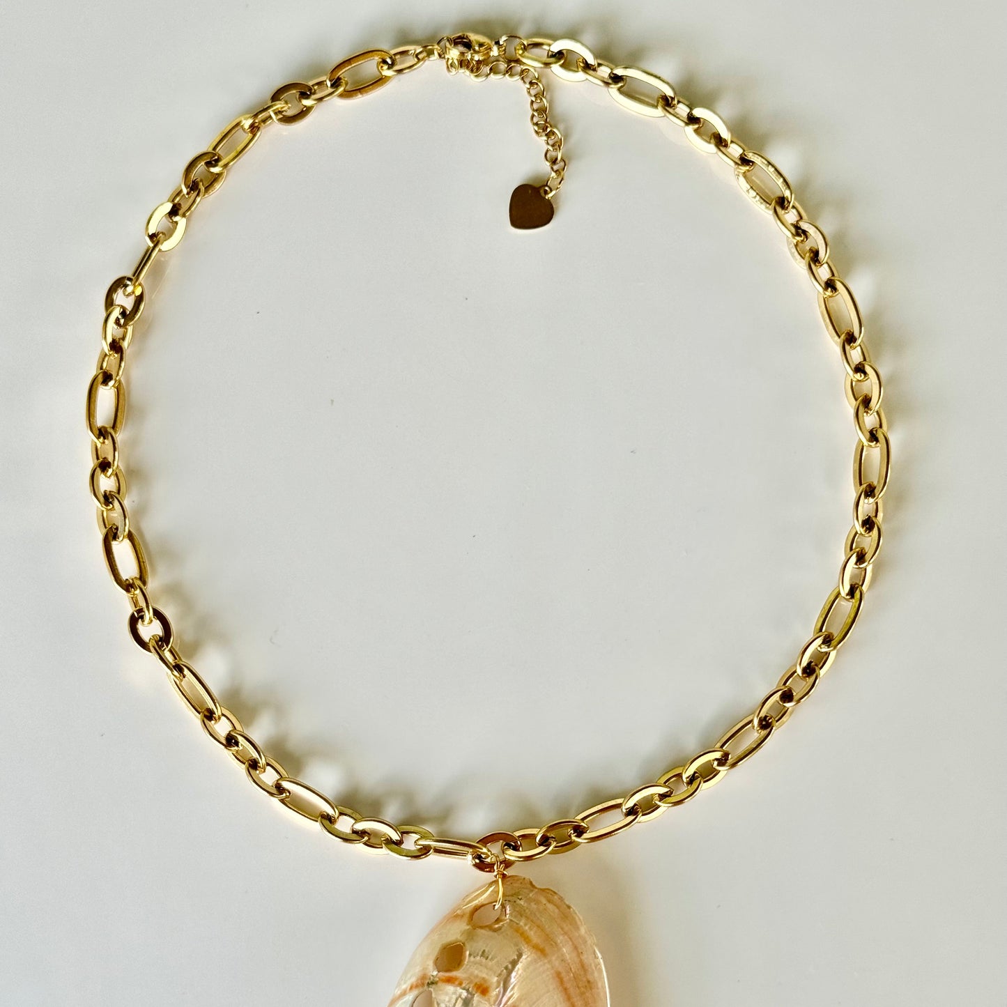 Carol Shell Necklace in beige - Detail of beige neutral tone shell design
