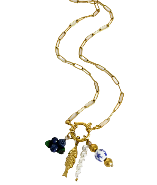 A gold-plated necklace with a series of charms including a fish and other small decorative items.