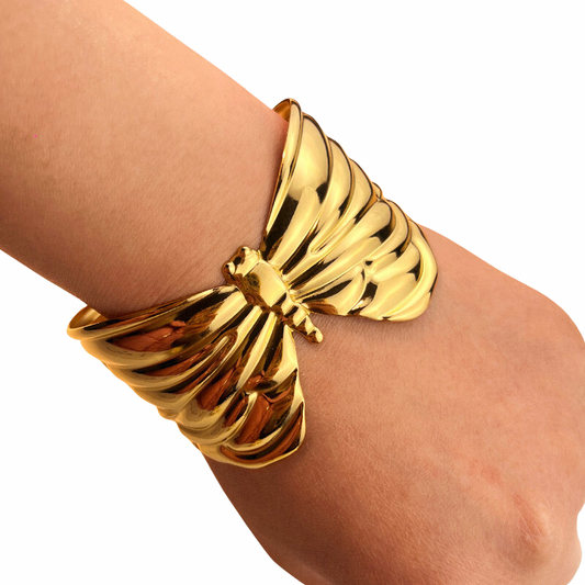 Diamond Necklace - elegant crystal pendant necklace by SIETE Y UNO
Gold bracelet on a wrist against a white background